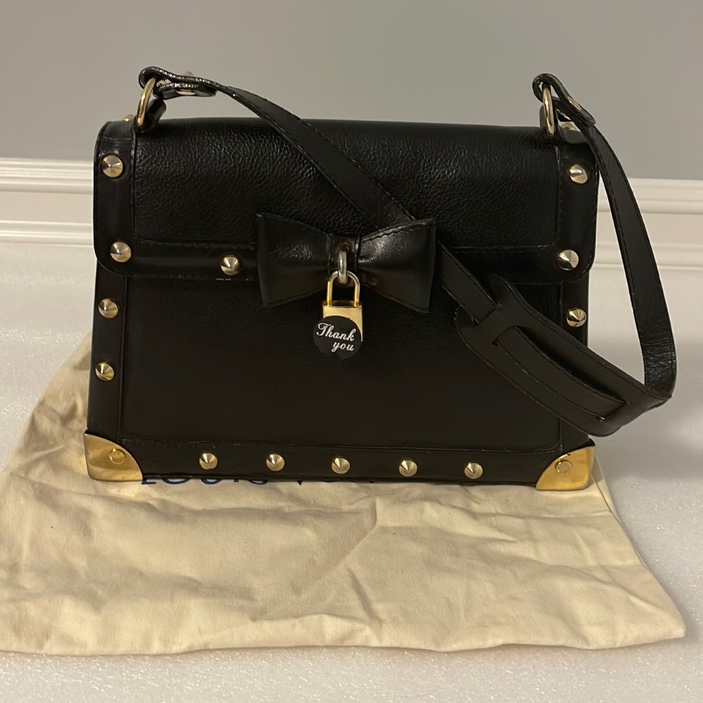 Luxury Vintage studs and genuine leather handbag